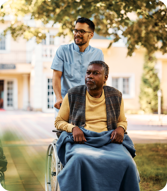 Caretaker caring an elderly man