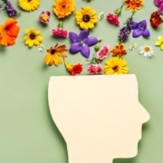 animated visual of human head with pretty flowers exploding from it - Maple Care Homes mental health care